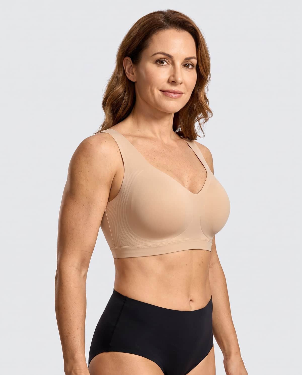 Woman wearing the beige seamless Lifting Jelly Bra